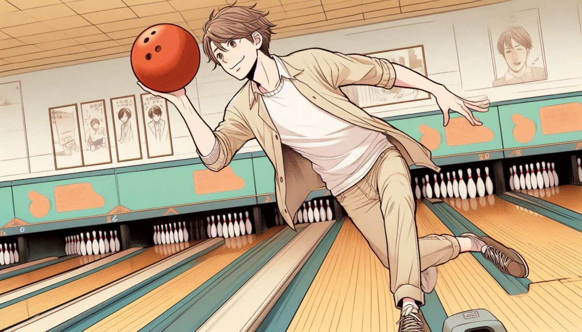 ボウリングのボールを持って楽しそうな表情の男性